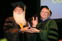 CalSouthern President, Dr. Caroll Ryan presents John Galaska, PsyD, with the President’s Award for Doctoral Project Excellence